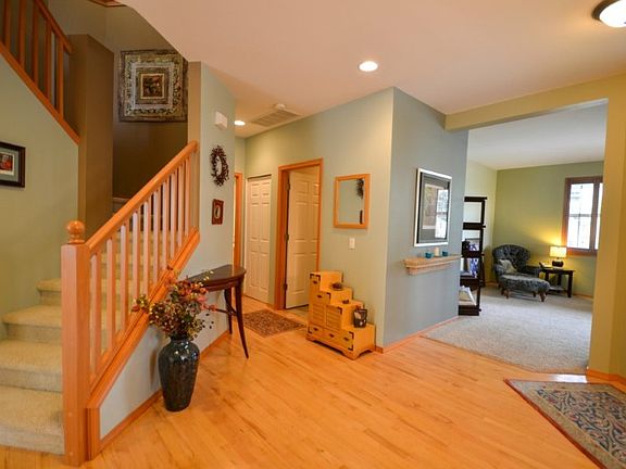 Exotic and extra large entry with Hardwood floors. Room for guests to mingle. The sun filled living area could be used for an office or ???? 