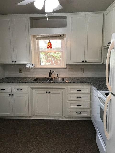 updated kitchen with granite countertop