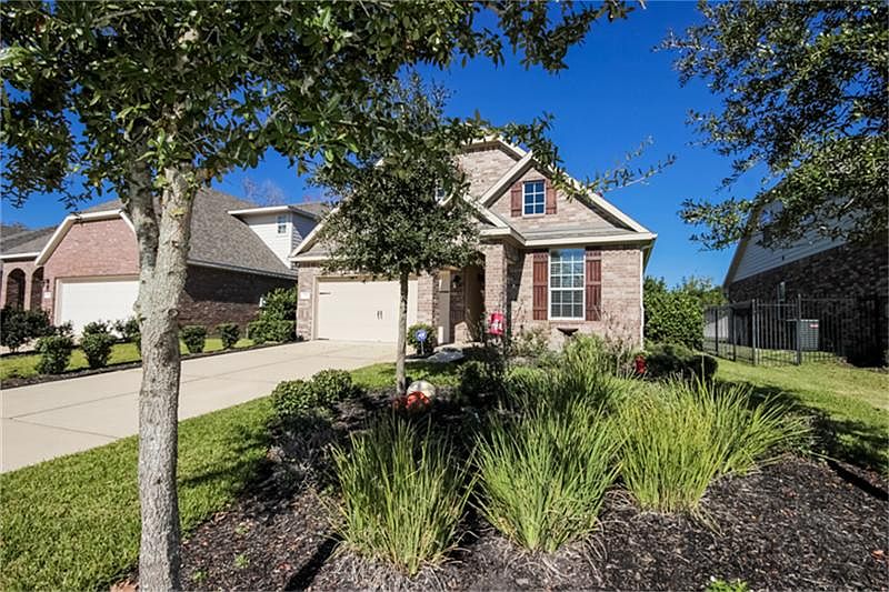 Lushly landscaped with full sprinkler system.