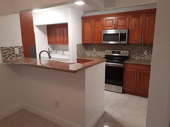 4th image of 860 NE 209th Ter APT 202-33
