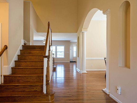 2 Story Foyer and duel staircase to upper level