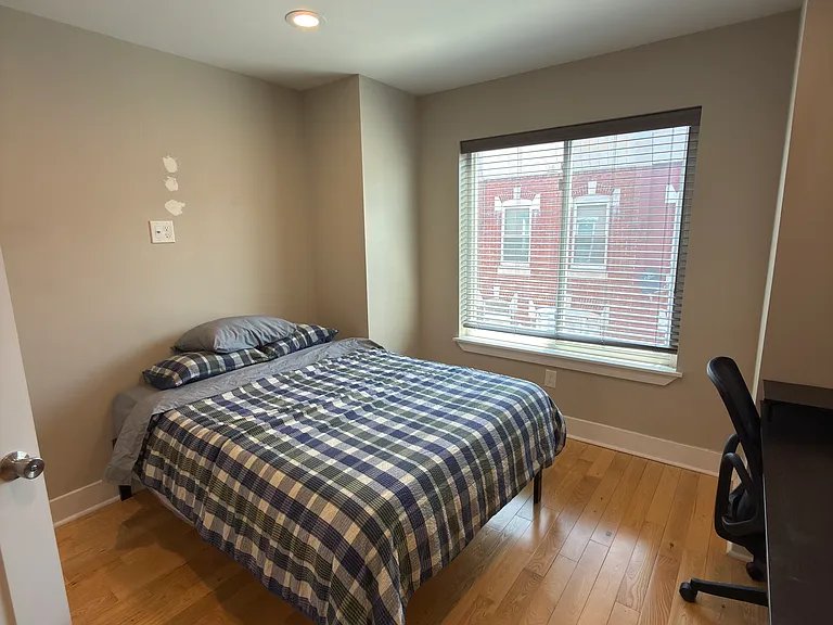 Cozy bedroom with natural light.