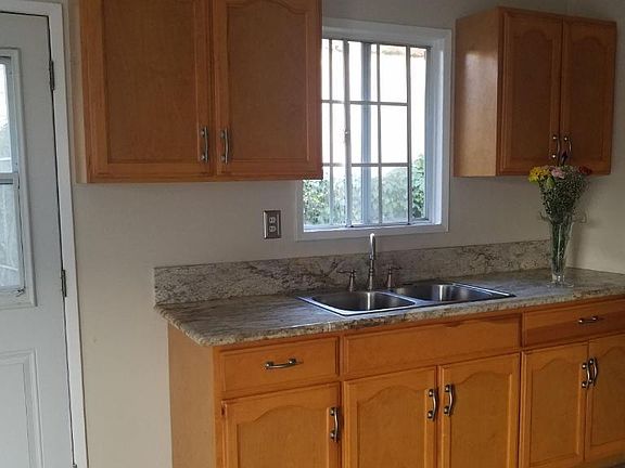 Beautiful Granite Countertops and Stainless Steel sink