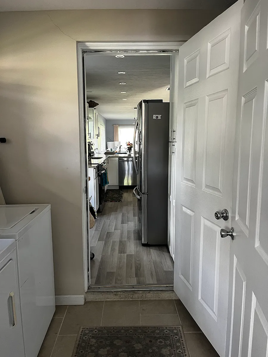 entrance from garage to laundry room - 7113 Bright Creek Dr #100
