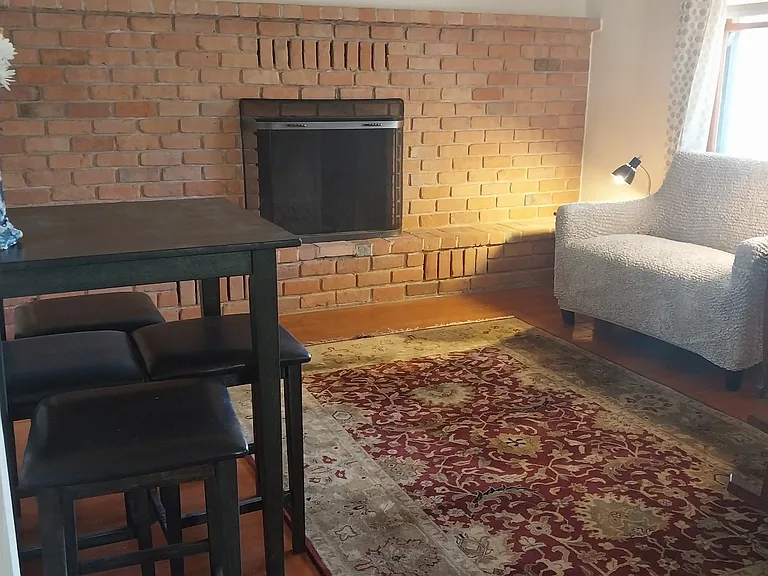 Fireplace with sitting and dining areas