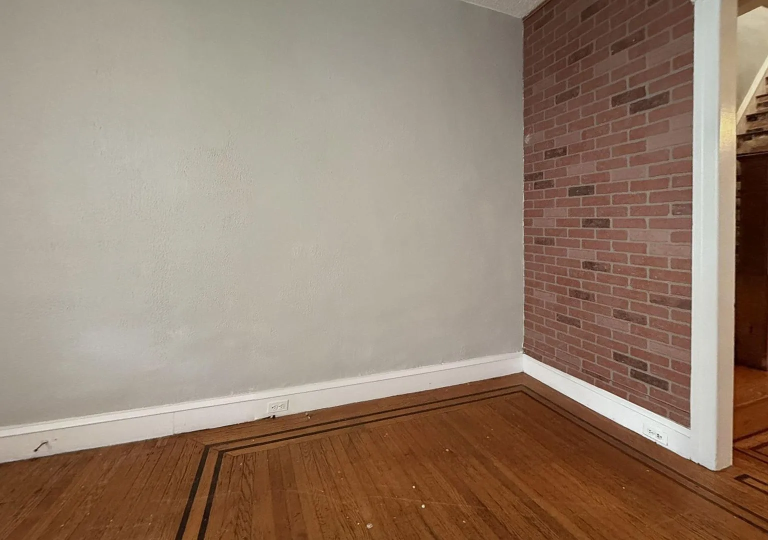 Classic 2-BR Rowhouse with Exposed Brick in Hunting Park — Photo 3
