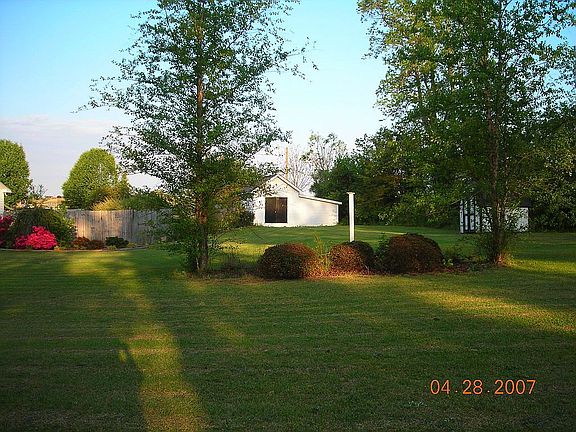 Side view of larger wired storage building