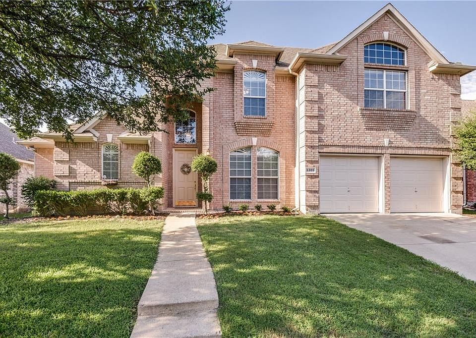 Gorgeous tree-lined street with pool, playground and club house down the street. This home looks right into a lush green belt with trees.