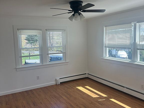 Living room, plenty of windows and sunlight.