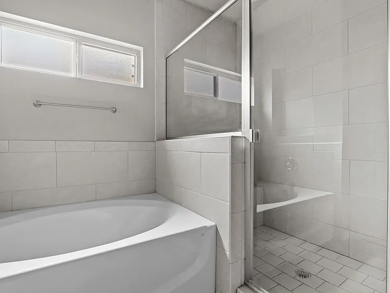 Elegant Garden Tub with Walk-In Shower