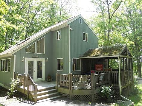 Side View of Home with Screened in Porch