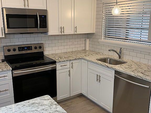 New Granite and subway tile.
