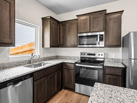 The kitchen has energy-efficient appliances.