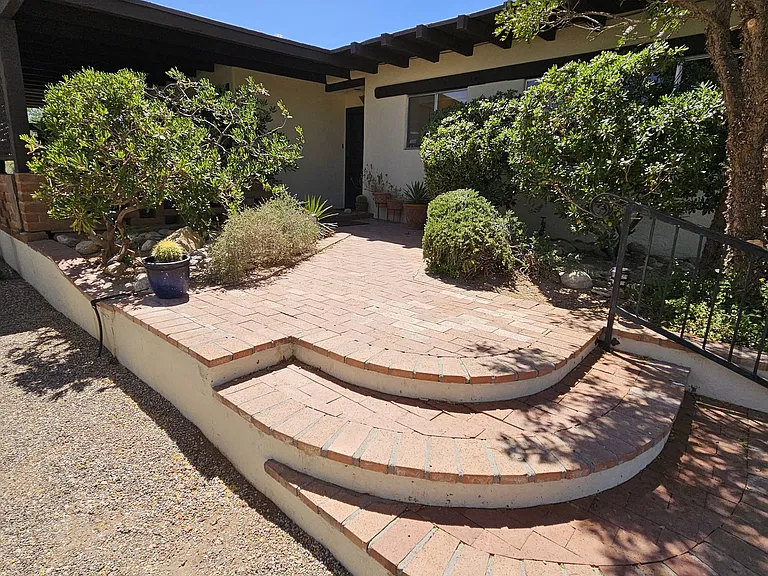 Entry way. Path lights and motion sensor porch lights.