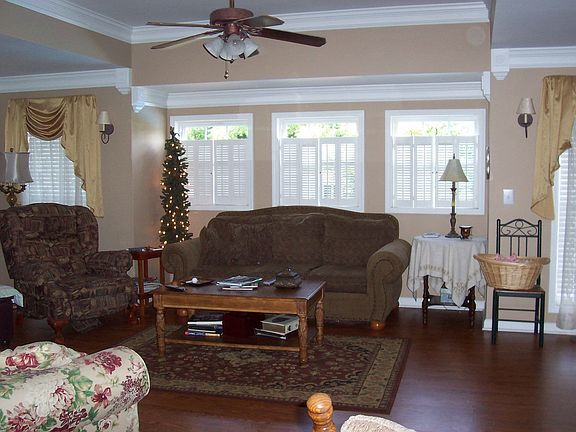 Family room has a gas fireplace and looks out to the pool.