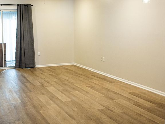 Large living room / dining room combo with plenty of living space.