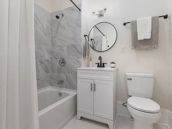 3rd image of 211 W 6th Ave