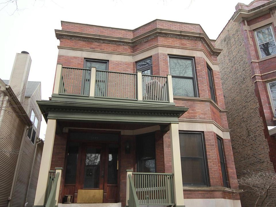 Rent the spacious, sun-lit second floor of this vintage two-flat with modern amenities