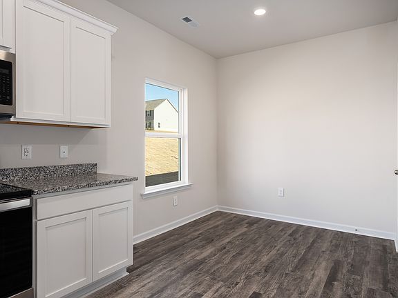 The cozy breakfast nook is perfect for sharing a cup of coffee with your family