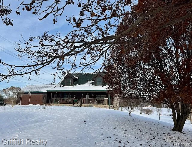 5748 W Coon Lake Rd photo 1