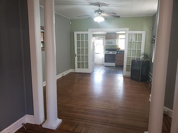 House comes unfurnished. Includes wine fridge shown in picture.