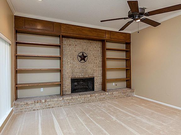 Windows lining hallway to bedroom area .