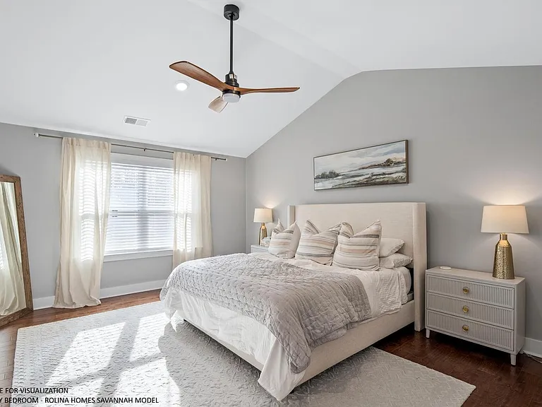 PRIMARY BEDROOM PICTURE FROM A DIFFERENT SAVANNAH MODEL RECENTLY BUILT BY ROLINA HOMES
