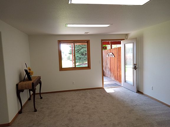 Living room view to lower entry door
