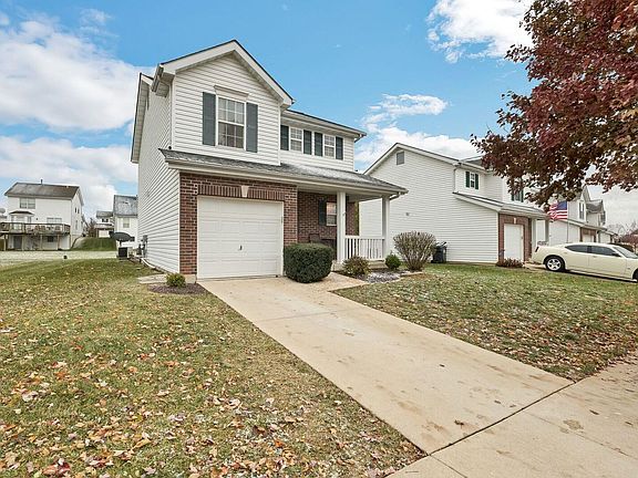Ample spacing between homes and common ground in backyard.