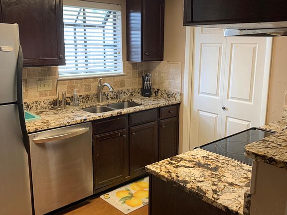 Granite countertops, stainless steel appliances washer and dryer
