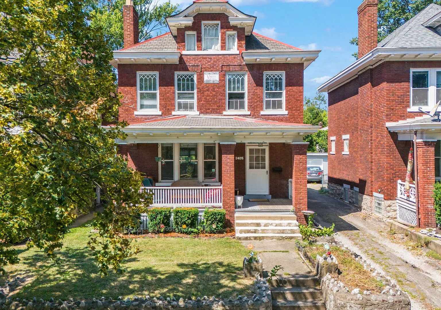 Charming 5-Bedroom Home with Exposed Brick and Modern Upgrades — Photo 2