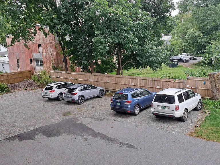 one parking spot in the back of the house