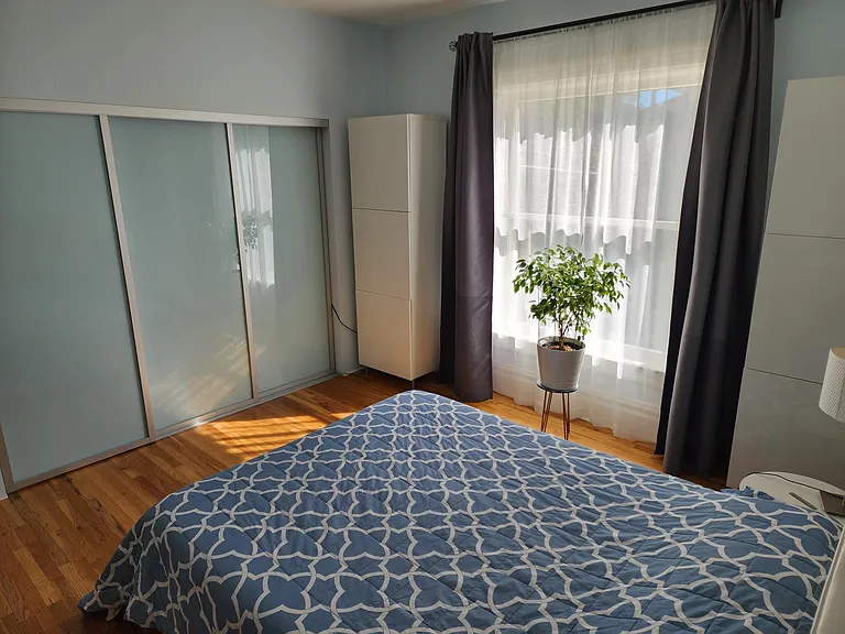 Master bedroom with door to walk in closet.
