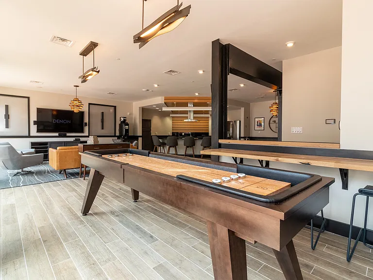How many other apartments in Henrico, VA have a shuffleboard table?