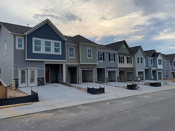 Actual property (2nd from the left - green). First one is the model home.