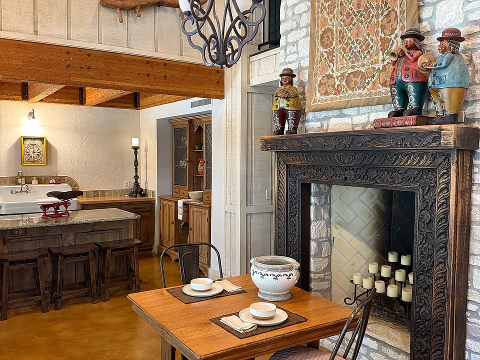 Just between the living room and kitchen, this dining nook is perfect for a quick bite or a full meal. The view to the left is the patio/pool area, making dining here something you will want to take your time and enjoy!