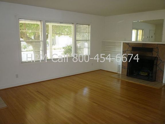 Wood burning f/p and h/w floor