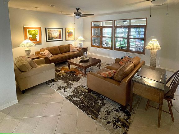 With brand new full leather couches and abstract rug this photo taken from the foyer does not do it justice. Such a wonderful room for holidays, gatherings and reading.
