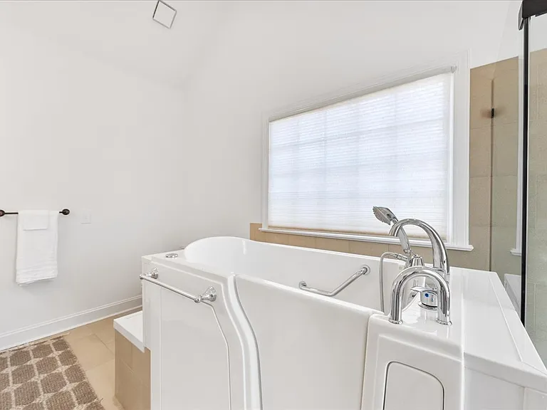 sit-in tub with jacuzzi tub