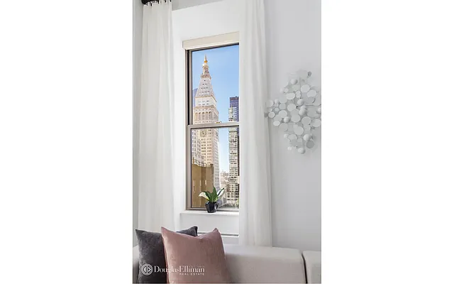 Sold by Douglas Elliman | media 18