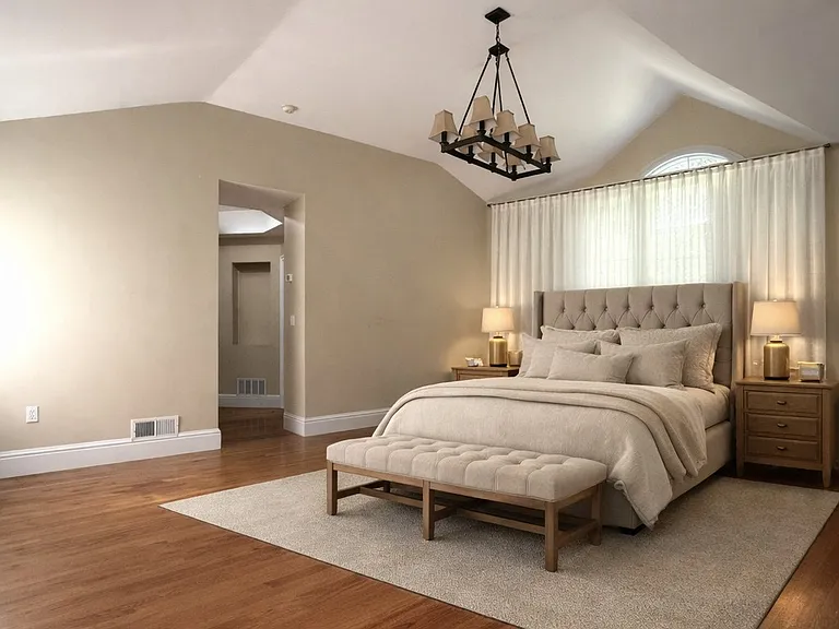 primary bedroom with vaulted ceilings
