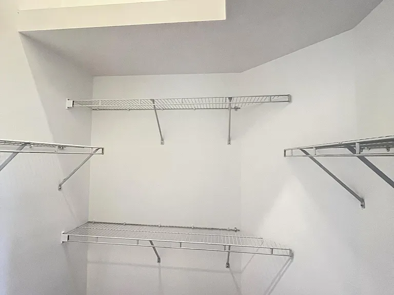 main bedroom walk in closet