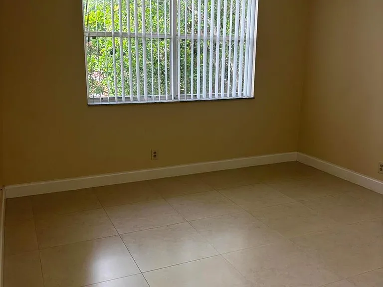8761 Wiles Rd #304 — Photo 11