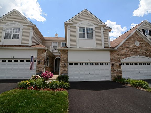 Gorgeous Stone Front, Vinyl Siding and Freshly Painted Exterior