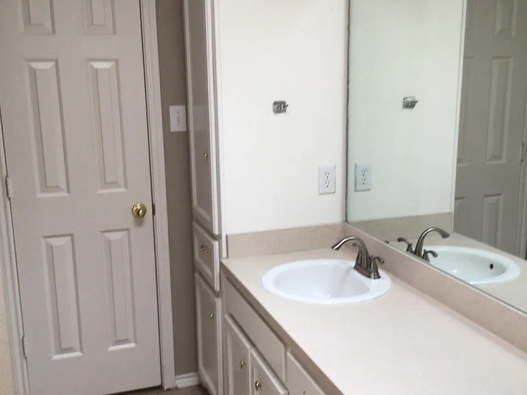 Master bath with walk-in closet