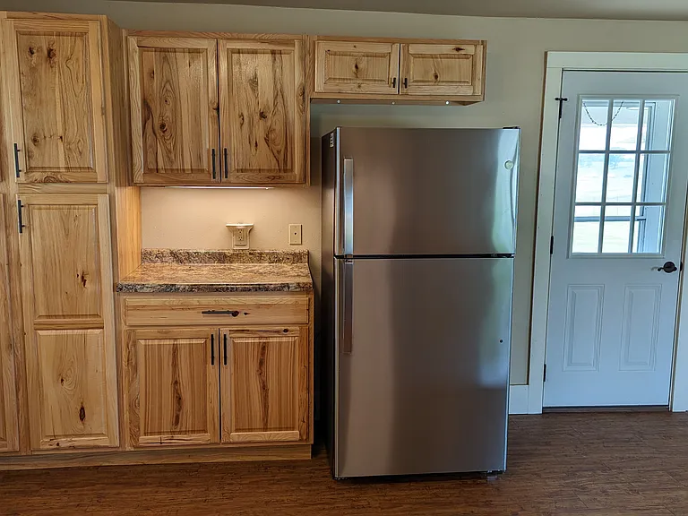 Lots of kitchen storage including pantry