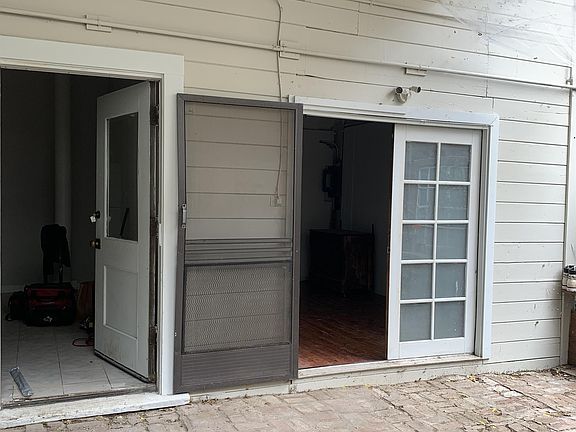 The other two doors to backyard