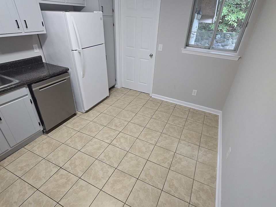 Kitchen with door to laundry room.