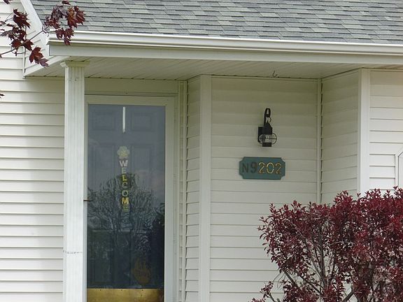 covered front porch as guests.