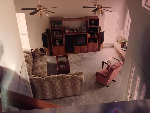 At top of stairs looking into living room